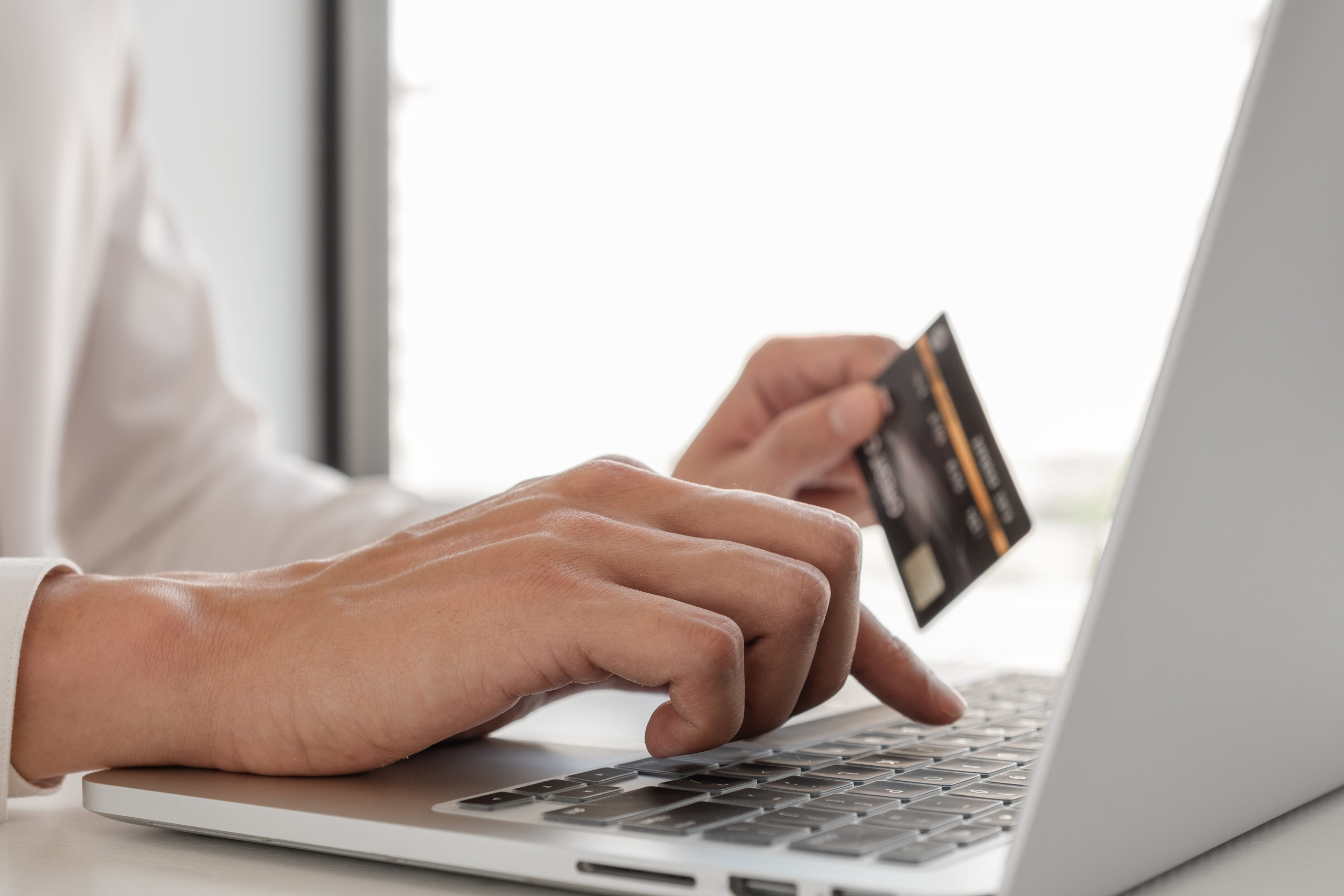 A Man Paying Online For An Evisa Application